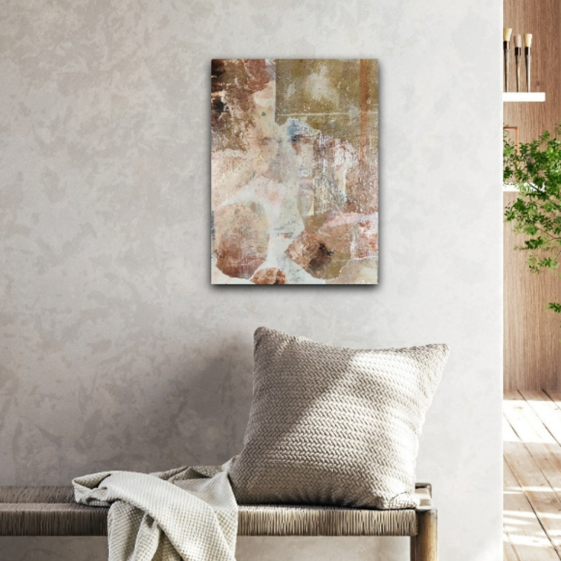 Abstract painting Breaking Light hanging in a living room, featuring warm earthy tones and glowing highlights, adding a serene, natural touch