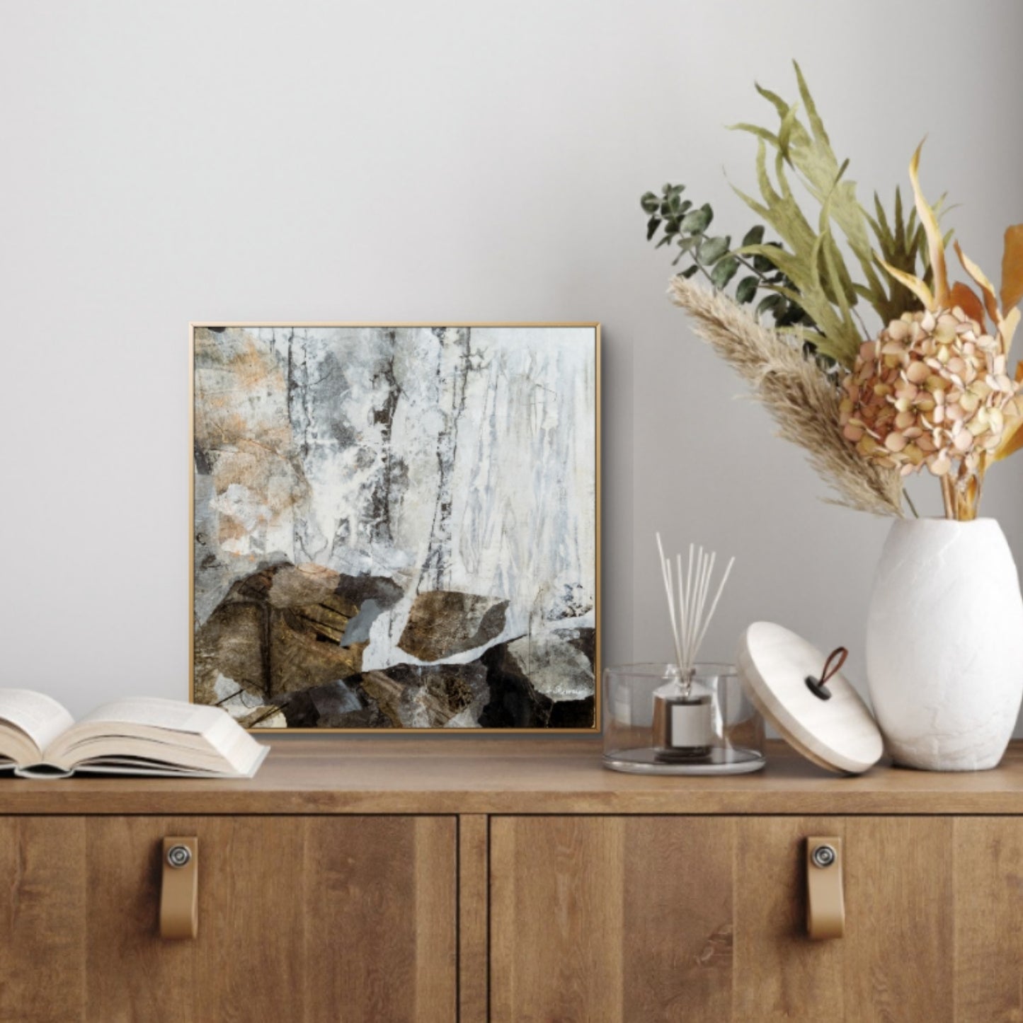 Modern nature-inspired artwork featuring muted grays, browns, and golds with organic textures and metallic highlights that shift with light.