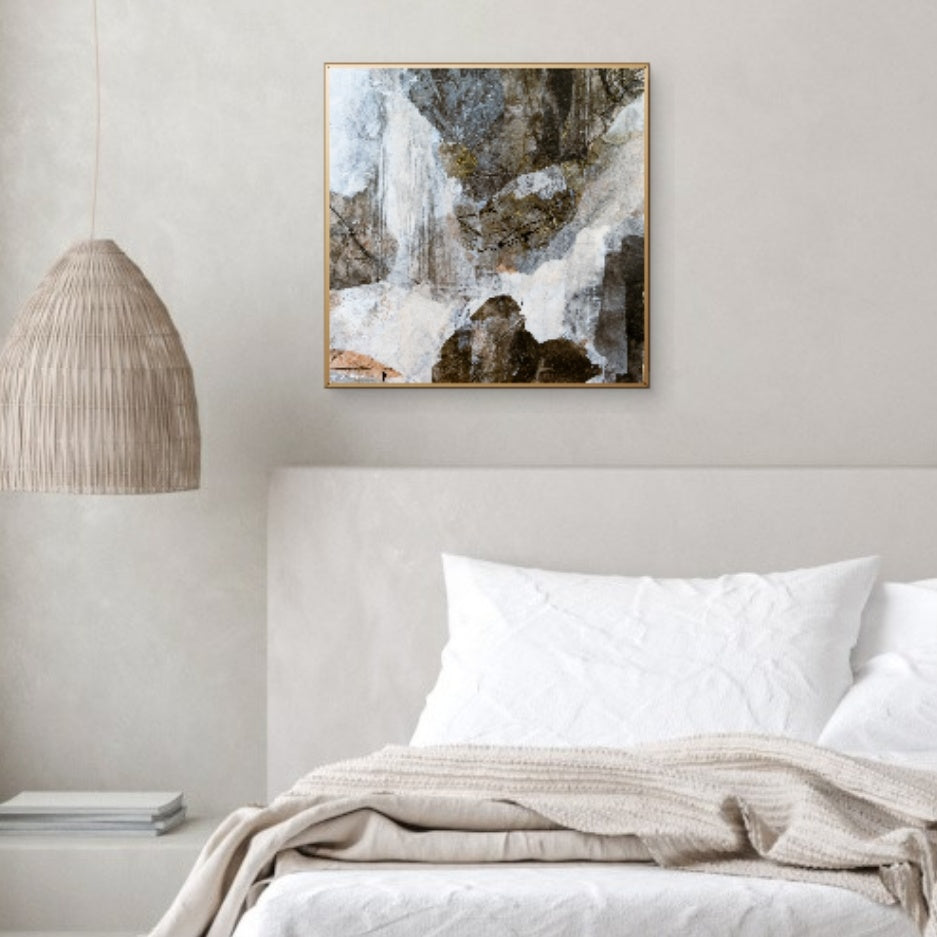 "A Chill in the Air" displayed above a neutral-toned bed with soft linens and a woven lamp, complementing a cozy, nature-inspired bedroom setting.