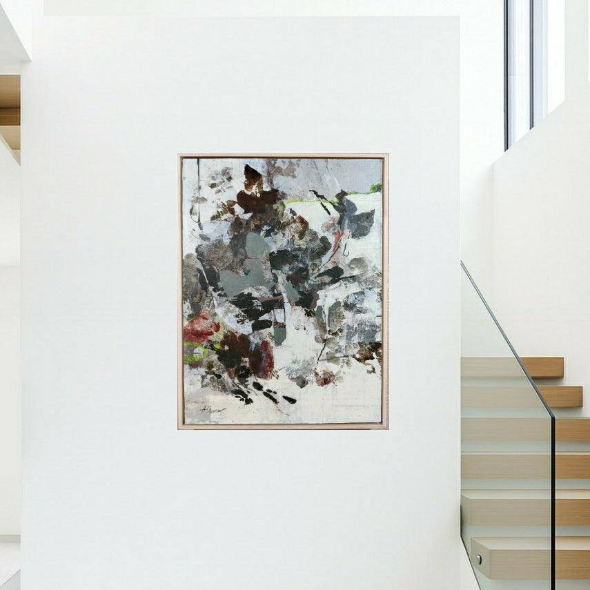 Abstract nature painting on a white wall above a staircase