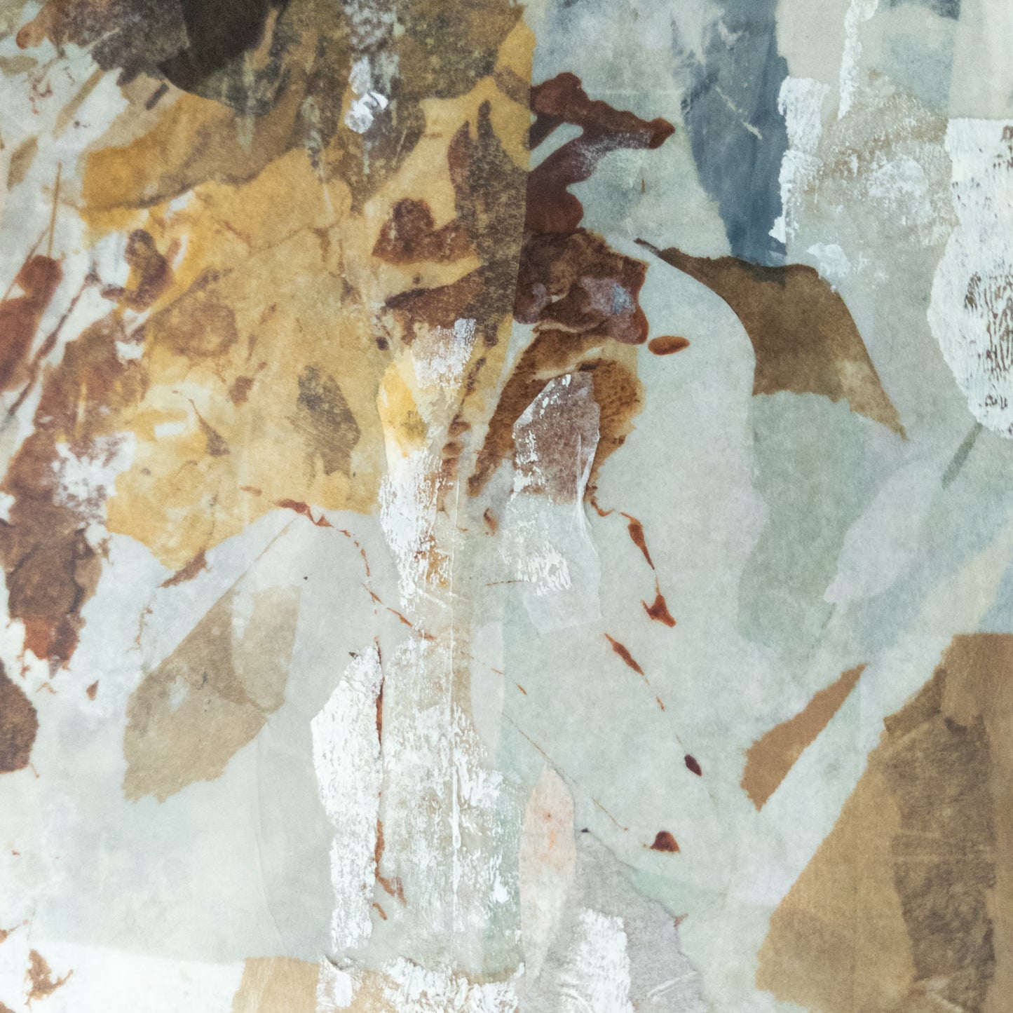 Close-up of a textured surface with brown, beige, and white colors