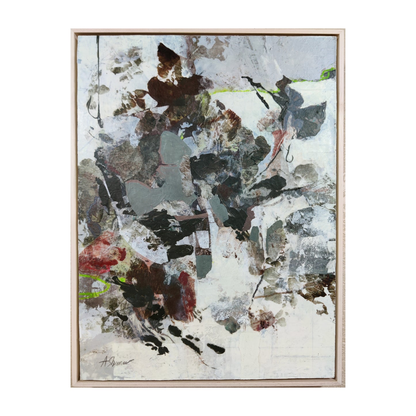 Nature based abstract art piece with a signature in a wooden frame on a white background